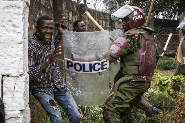 Protesters are detained by riot policemen during protests accusing the president of poor governance and calling for his resignation, in Nairobi, Kenya, July 16, 2024. (Photo by Ed Ram/AP Photo)