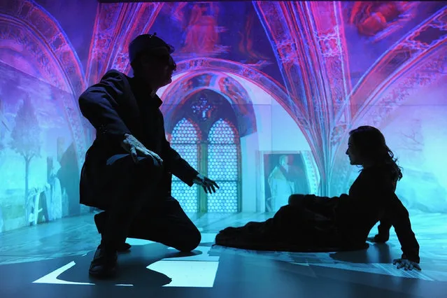 Actress Chiara Martini (R) and Director of the Theatrical Academy in Florence Pietro Bartolini performs on stage during a rehearsal at the 3D theatre at Perceptual Robotics Laboratory of Scuola Superiore Sant'Anna of Pisa on October 26, 2016 in San Giuliano Terme near Pisa, Italy. The 3D theater is a collaboration between the Theatrical Academy in Florence and the Perceptual Robotics Laboratory (Percro) of Scuola Superiore Sant'Anna and is the first trial worldwide of this type. The theater merges the most advanced technologies of virtual reality and traditional theatrical techniques to create a new type of visual experience. The play is due to be performed at a major theatre in Florence in July, 2017. (Photo by Laura Lezza/Getty Images)