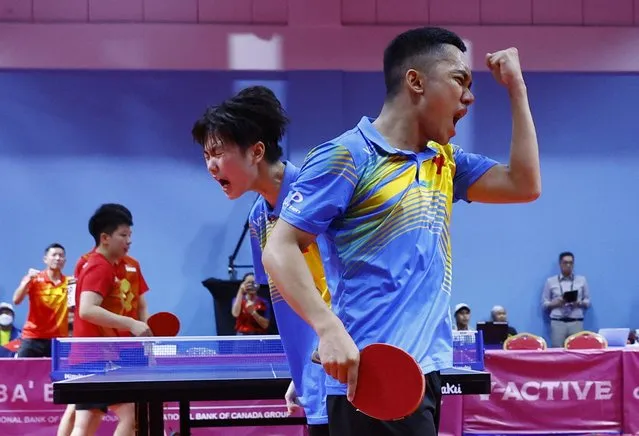 Vietnam's Anh Hong Dinh and Mai Ngoc Tran react during their mixed doubles final table tennis match against Singapore's Clarence Zhe Yu Chew and Jian Zeng at Morodok Table Tennis Hall in Phnom Penh, Cambodia on May 14, 2023. (Photo by Kim Kyung-Hoon/Reuters)