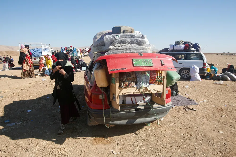 Iraqis Flee Mosul Fighting