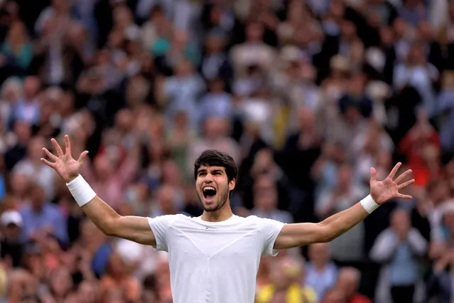 Spain's Carlos Alcaraz celebrates winning his semi-final match against Russia's Daniil Medvedev at Wimbledon in London, England on July 14, 2023. (Photo by Andrew Couldridge/Reuters)
