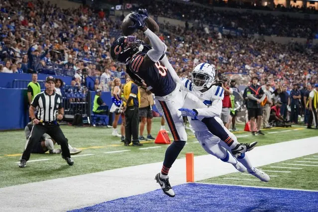 Chicago Bears wide receiver Daurice Fountain, left, makes a touchdown reception in front of Indianapolis Colts cornerback Darius Rush during the second half of an NFL preseason football game in Indianapolis, Saturday, August 19, 2023. (Photo by Michael Conroy/AP Photo)