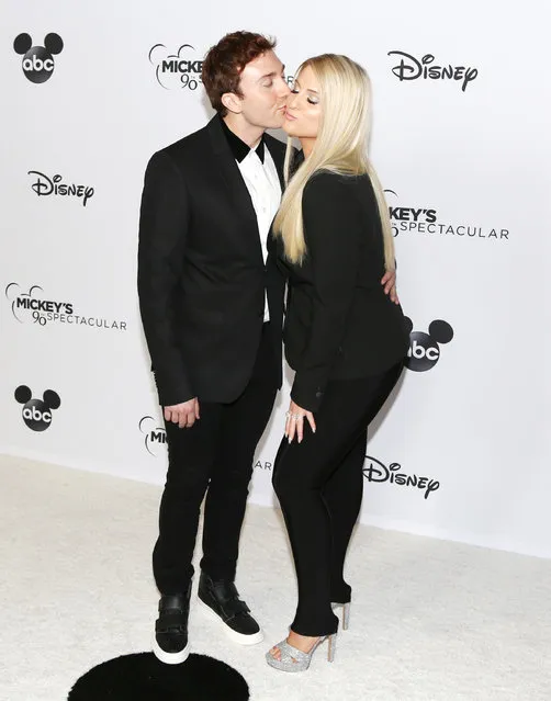Celebs attend Mickey's 90th Spectacular at The Shrine Auditorium in New York on October 6, 2018. Here: Daryl Sabara and Meghan Trainor. (Photo by Milla Cochran/StartraksPhoto.com)