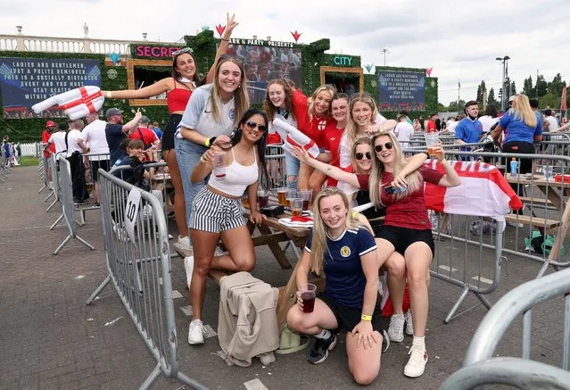 England fans and a Scotland fan at the fan zone in Trafford Park, Manchester on Sunday, June 13, 2021 as they watch the UEFA Euro 2020 Group D match between England and Croatia held at Wembley Stadium. (Photo by Bradley Collyer/PA Images via Getty Images)