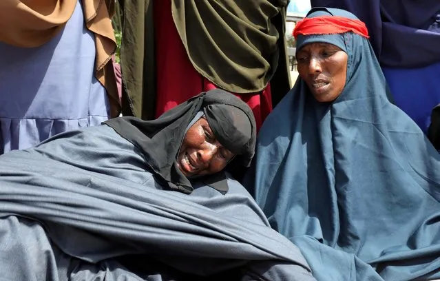 Somali women, who say their sons have been used as fighters in the Tigray conflict in neighbouring Ethiopia, react during a protest in Mogadishu, Somalia on June 10, 2021. (Photo by Feisal Omar/Reuters)