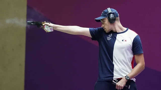 Jean Quiquampoix, of France, competes in the men's 25-meter rapid fire pistol at the Asaka Shooting Range in the 2020 Summer Olympics, Monday, August 2, 2021, in Tokyo, Japan. Quiquampoix went on to take the gold medal. (Photo by Alex Brandon/AP Photo)