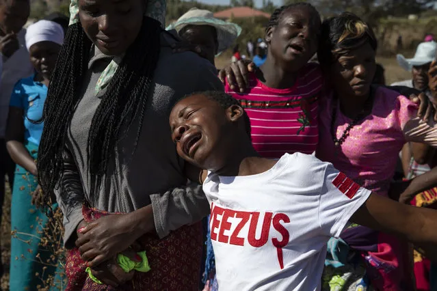 The funeral takes place for father of four, Ishmael Kumire, 41, on August 4, 2018 in Chinamhora, Zimbabwe. Ishmael was killed during deadly clashes on August 01. Latest figures suggest that six people died after troops opened fire on demonstrators on a day after the polls had closed. The election was the first since Robert Mugabe was ousted in a military coup last year, and featured a close race between Mnangagwa and opposition candidate Nelson Chamisa of the Movement for Democratic Change (MDC Alliance). (Photo by Dan Kitwood/Getty Images)