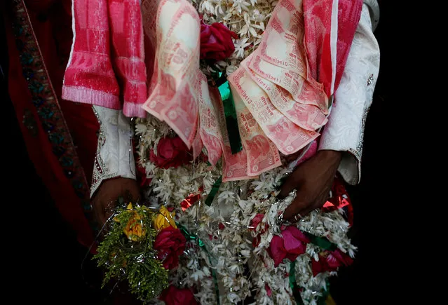 A groom arrives for a mass marriage ceremony, in which, according to its organizers, 75 Muslim couples took their wedding vows, in Mumbai, India, January 22, 2017. (Photo by Danish Siddiqui/Reuters)