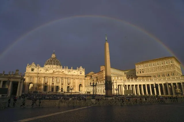 A rainbow shines over St.Peter's Basilica prior to the start of Pope Francis weekly general audience at the Vatican Wednesday, October 25, 2023. (Photo by Gregorio Borgia/AP Photo)