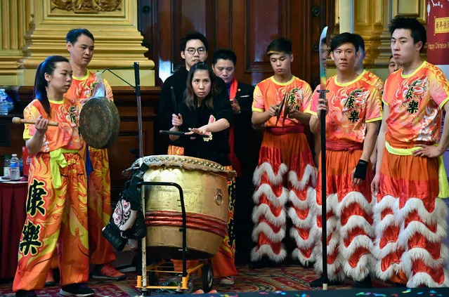 The Chinese community in Glasgow celebrate Chinese New Year in Glasgow City Chamber on January 29, 2017. The Chinese Lunar New Year also known as the Spring Festival, which is based on the Lunisolar Chinese calendar, is celebrated from the first day of the first month of the lunar year and ends with Lantern Festival on the fifteenth day. (Photo by Jeff J. Mitchell/Getty Images)