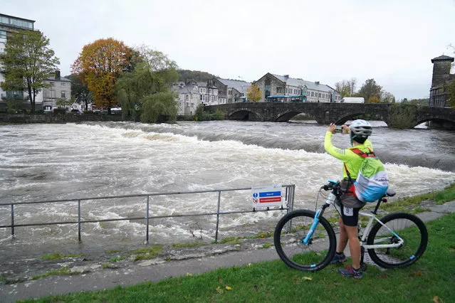 High water levels on the River Kent in Kendal, Cumbria on Thursday, October 28, 2021, where the Met office has warned of life-threatening flooding and issued amber weather warnings as the area was lashed with “persistent and heavy rain”. Up to 300mm is expected to fall in parts of the region, which typically sees an average of 160mm in October. (Photo by Owen Humphreys/PA Images via Getty Images)