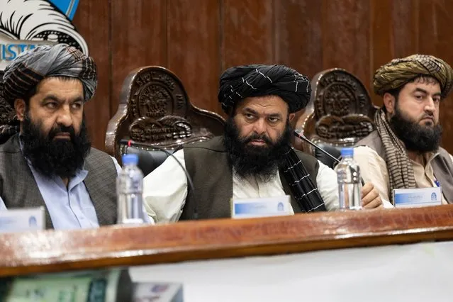 Acting Governor of Da Afghanistan Bank (DAB) Hidayatullah Badri (C) looks on during a press conference at Da Afghanistan bank in Kabul on December 27, 2023. (Photo by Wakil Kohsar/AFP Photo)