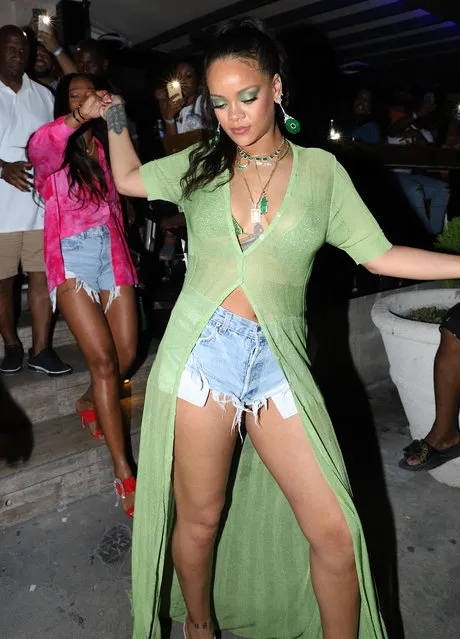 Rihanna, 31, shows up fashionably late (2:00 AM) in support of her brother, Rorrey's, party (scheduled for 9:00 PM) at Jamestown Bar, Bridgetown Barbados on April 27, 2019, and is a sight to behold as she shows off her incredible frame. She greets her brother with big smiles before heading into club to have a night out partying. (Photo by Kyle Babb/Splash News and Pictures)