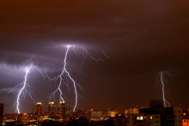 Lightnings strike the sky above the Israeli coastal city of Netanya, north of Tel Aviv, on November 04, 2018. (Photo by Jack Guez/AFP Photo)