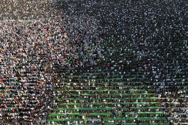 A drone view of Albanian Muslims attending Eid al-Fitr prayers to mark the end of the holy fasting month of Ramadan, at Skanderbeg Square in Tirana, Albania, on April 10, 2024. (Photo by Florion Goga/Reuters)