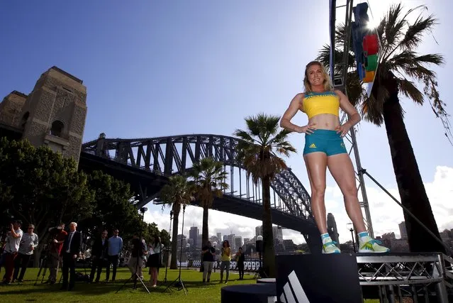 Australian Olympic team member Sally Pearson poses during the official launch of the team uniforms for the 2016 Rio Olympics, in front of the Sydney Harbour Bridge, Australia, April 19, 2016. (Photo by David Gray/Reuters)