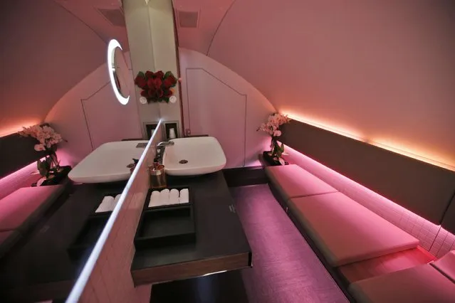 Interior view of the toilets in the second floor first class section of the Airbus A380 of Qatar Airways during a visit at the Paris Air Show, in Le Bourget airport, north of Paris, Wednesday, June 17, 2015. Qatar Airways has brought 4 Airbus A380's in service since last year. (AP Photo/Francois Mori)