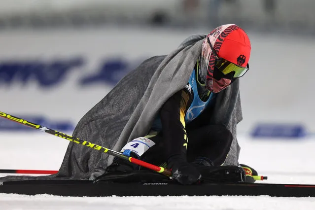 Manuel Faisst of Team Germany reacts following the Individual Gundersen Large Hill/10km, Cross Country Competition Round on day 11 of 2022 Beijing Winter Olympics at The National Cross-Country Skiing Centre on February 15, 2022 in Zhangjiakou, China. (Photo by Lars Baron/Getty Images)