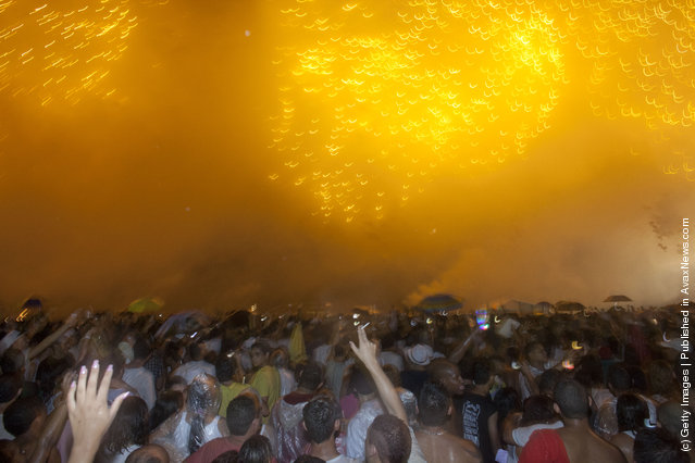 Brazilians Flock To Ocean For New Year's Eve Ritual