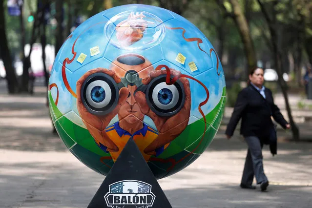Giant soccer balls painted by various artists are seen during “Expo Balon” as part of the 66th FIFA Congress at Reforma Avenue, in Mexico City, Mexico, May 11, 2016. (Photo by Edgard Garrido/Reuters)