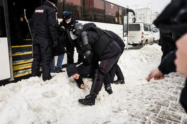A person is detained during an anti-war protest, following Russia's invasion of Ukraine, in Yekaterinburg, Russia on March 6, 2022. (Photo by Reuters/Stringer)