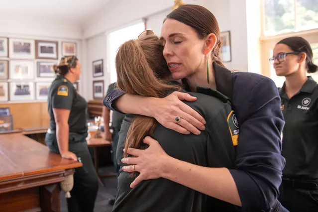 New Zealand Prime Minister Jacinda Ardern meets with first responders at the Whakatane Fire Station on December 10, 2019 in Whakatane, New Zealand. Five people are confirmed dead and several people are missing following a volcanic eruption at White Island on Monday. (Photo by Dom Thomas/Radio NZ – Pool/Getty Images)