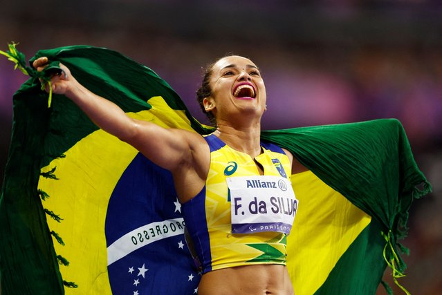 Fernanda Yara da Silva of Brazil celebrates after winning gold in the women's 400m T47 final in Saint-Denis, France on August 31, 2024. (Photo by Stephanie Lecocq/Reuters)