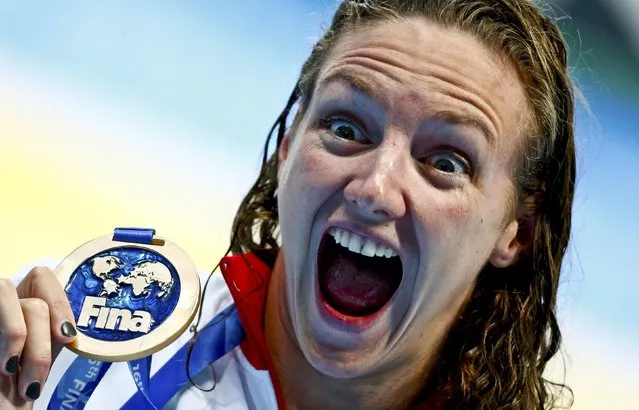 Katinka Hosszu of Hungary displays her gold medal after winning the women's 200m individual medley final at the Aquatics World Championships in Kazan, Russia August 3, 2015. (Photo by Hannibal Hanschke/Reuters)