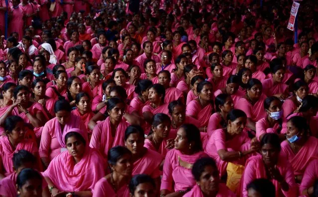 Members of All India United Trade Union Center (AIUTUC) and Accredited Social Health Activist (ASHA) workers take part in a protest in Bangalore, India, 17 May 2022. Over a thousand ASHA workers from different parts of the state took part in a protest demanding to include a fixed monthly honorarium of 149.48 euro and the delinking of the Reproductive Child Health (RCH) portal from ASHA Soft, the Centre’s online payment system for ASHA. (Photo by Jagadeesh N.V./EPA/EFE)