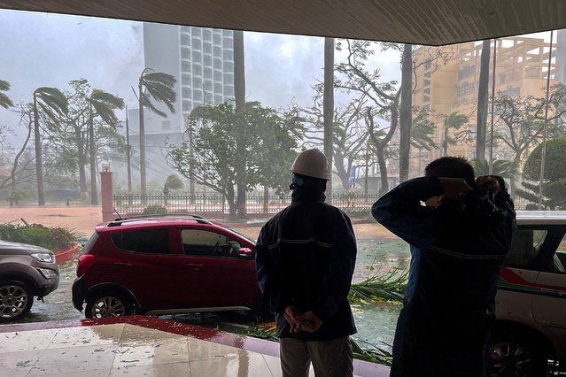 Rescue workers stand due to the impact of Typhoon Yagi, in Do Son district, Hai Phong city, Vietnam on September 7, 2024. (Photo by Minh Nguyen/Reuters)