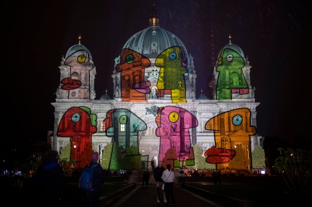 Berlin Cathedral is illuminated during a rehearsal for the upcoming Festival of Lights in Berlin, Germany, Wednesday, October 2, 2024. (Photo by Markus Schreiber/AP Photo)