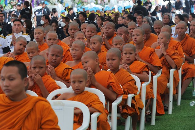 Young monks attend a memorial service for victims of a school bus fire, at Wat Khao Phraya Sangkharam School, Lan Sak, Uthai Thani province, Thailand, Tuesday, October 8, 2024. (Photo by Chatkla Samnaingjam/AP Photo)