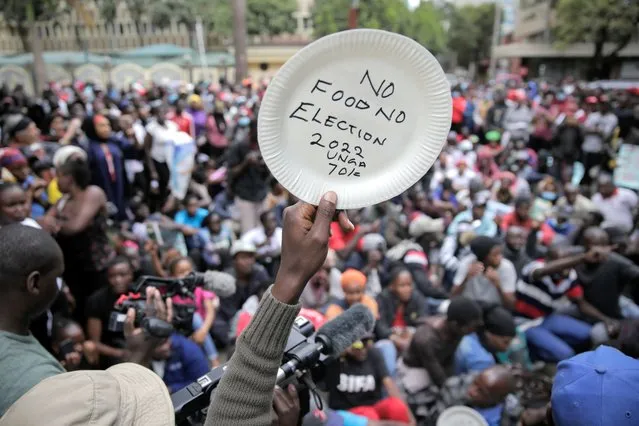 Kenyans protest against inflation and the cost of living, especially higher prices of basic foodstuffs, with reference to the upcoming August general election, in downtown Nairobi, Kenya Thursday, July 7, 2022. (Photo by Brian Inganga/AP Photo)