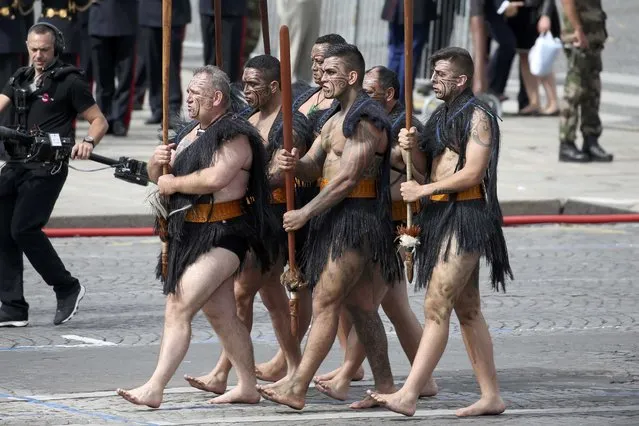 Maori warriors from New Zealand march during the traditional Bastille Day military parade on the Place de la Concorde in Paris, France, July 14, 2016. (Photo by Charles Platiau/Reuters)