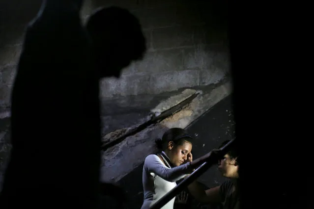 Massiel Borgesm, 18 (C), gets ready backstage to perform during the Cuban Otaku festival in Havana, Cuba, July 24, 2016. (Photo by Alexandre Meneghini/Reuters)