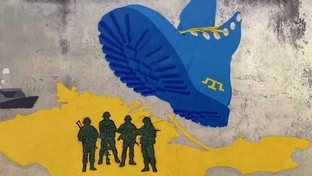 Street art shows Ukraine's attitude toward the Russian-occupied Crimea peninsula on Thursday, July 7, 2022, in Kharkiv, Ukraine. Ukraine's second-largest city continues to be regularly targeted by nearby Russia and much of the population has left. (Photo by Cara Anna/AP Photo)