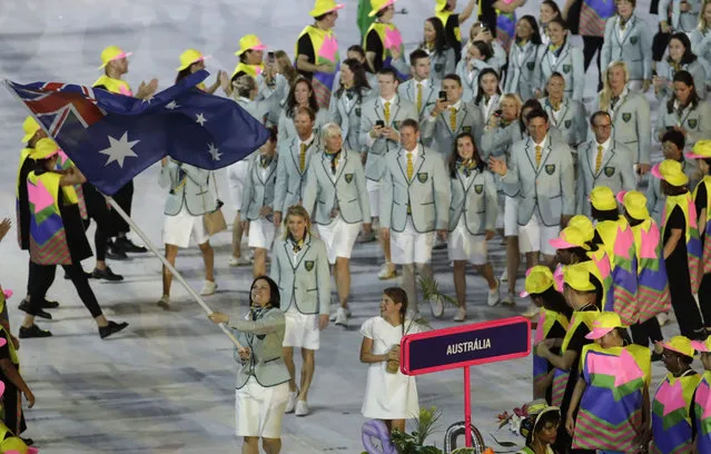 Anna Meares carries the flag of Australia during the opening ceremony for the 2016 Summer Olympics in Rio de Janeiro, Brazil, Friday, August 5, 2016. (Photo by Patrick Semansky/AP Photo)