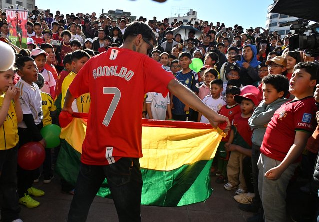 Fans of Portugal's forward Cristiano Ronaldo gather in a square in La Paz on February 5, 2025, to celebrate his 40th birthday. (Photo by Aizar Raldes/AFP Photo)