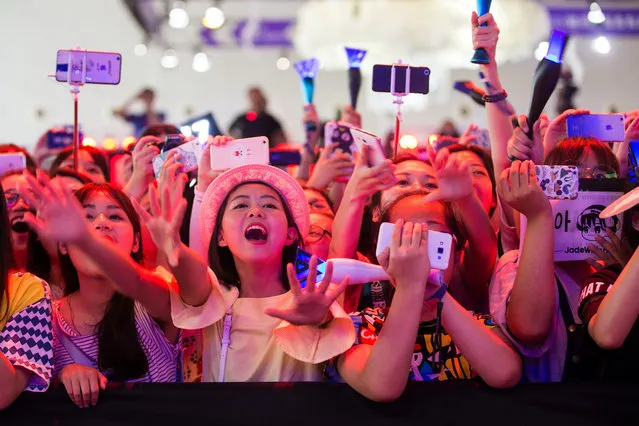 In this Friday, July 22, 2016 photo, Chinese fans cheer during a concert by the South Korean K-Pop group Winner in Shanghai. Chinese anger at South Korea over its decision to deploy an U.S. anti-missile defense system appears to be threatening everything from appearances by the stars of K-Pop to future cooperation on North Korea at the United Nations. (Photo by Chinatopix via AP Photo)