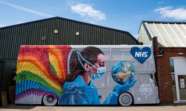 A mural dedicated to NHS staff has been created on the side of a stationary bus in Nuneaton, Warwickshire on May 19, 2020. (Photo by Jacob King/PA Images via Getty Images)