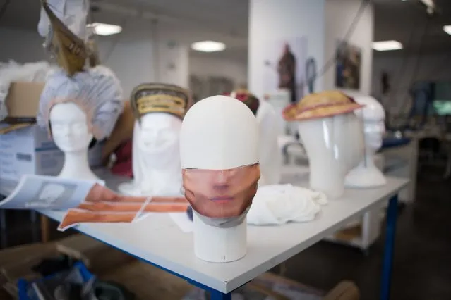A picture taken at the costume workshop of the Puy du Fou theme park shows protective face masks used in different historic shows, on June 5, 2020 in Les Epesses, western France. The park will reopen in few days after a partial lifting of lockdown restrictions taken to curb the spread of the COVID-19 pandemic, caused by the novel coronavirus. (Photo by Loic Venance/AFP Photo)