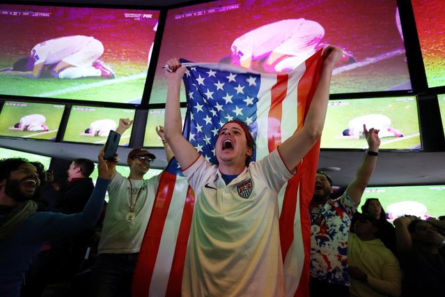 A United States fan celebrates after the match as United States qualify for the FIFA World Cup knockout stages, in Los Angeles, United States on November 29, 2022. (Photo by Mike Blake/Reuters)