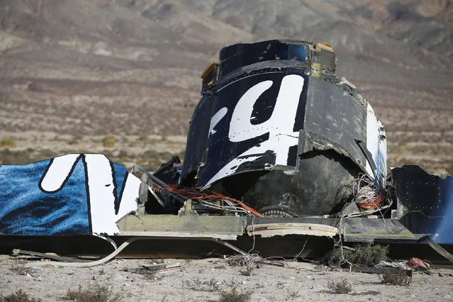 A piece of debris is seen near the crash site of Virgin Galactic's SpaceShipTwo near Cantil, California, on November 2, 2014. (Photo by Lucy Nicholson/Reuters)