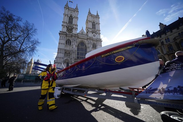A Royal National Lifeboat Institution (RNLI) lifeboat – an historic William Riley built in 1909 – outside Westminster Abbey in London ahead of a service of thanksgiving to mark the 200th anniversary of the RNLI on Monday, March 4, 2024. The William Riley is an oar-powered 34-foot Rubie class lifeboat, that was built in 1909, and saw service as an operational lifeboat until 1931. (Photo by Yui Mok/PA Images via Getty Images)