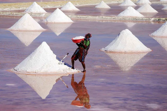 An Indian labourer works on a salt pan in the outskirts of Nagaur district in the Indian state of Rajasthan on March 7, 2018, ahead of International Women's Day. International Women's Day is celebrated on March 8 every year and commemorates the movement for women's rights. (Photo by Himanshu Sharma/AFP Photo)