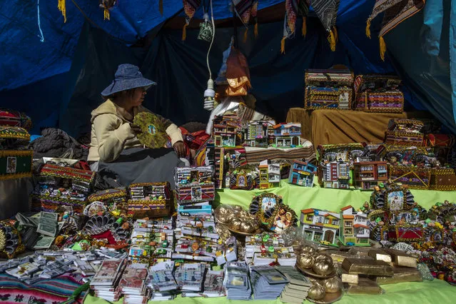 Items that people would like to manifest in the real world are sold on the first day of the annual Qoyllur Rit'i pilgrimage on May 27, 2018 in Ocongate, Peru. (Photo by Dan Kitwood/Getty Images)