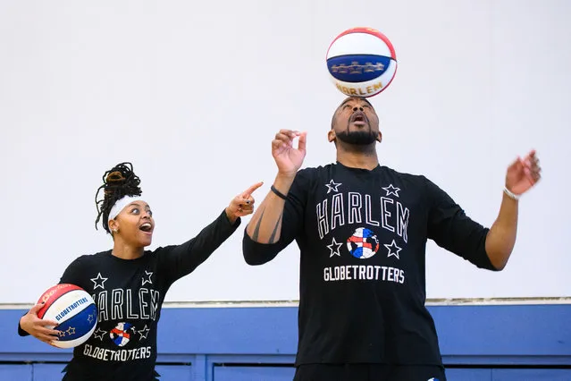 Cherelle “Torch” George and Scooter Christensen from the Harlem Globetrotters basketball team visit pupils from The Elmgreen School in London on Monday, March 13, 2023 for a training and motivational session ahead of their UK arena tour in April. (Photo by Matt Crossick/PA Wire)