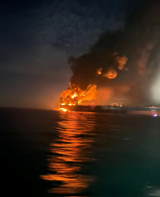 Flames and thick smoke rise from a tanker after blasts rocked two vessels from Russia's shadow fleet in the Black Sea near Turkey's Bosphorus Strait, in this image released on November 28, 2025. (Photo by Turkish Directorate General for Maritime Affairs/Handout via Reuters)
