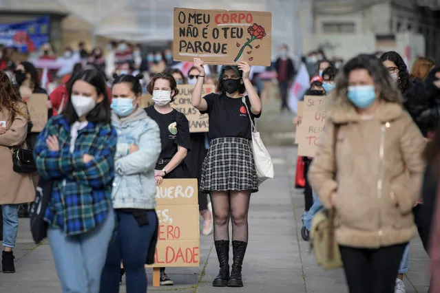 Several hundred people responded this Sunday, March 7, 2021 to the appeal of the Democratic Women's Movement (MDM), demonstrating, in Porto, Portugal in favor of equal rights and protesting against the lack of equality between men and women during Covid-19 pandemic. (Photo by Fernando Veludo/LUSA)