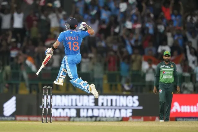 India's Virat Kohli celebrates his century during the Asia Cup cricket match between India and Pakistan in Colombo, Sri Lanka on Monday, September 11, 2023. (Photo by Eranga Jayawardena/AP Photo)